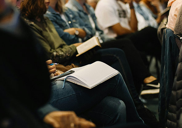 Congregation gathered in a warm, welcoming worship space